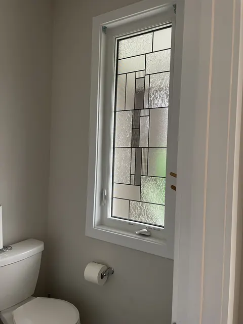 Bathroom window with decorative leaded glass, Ottawa