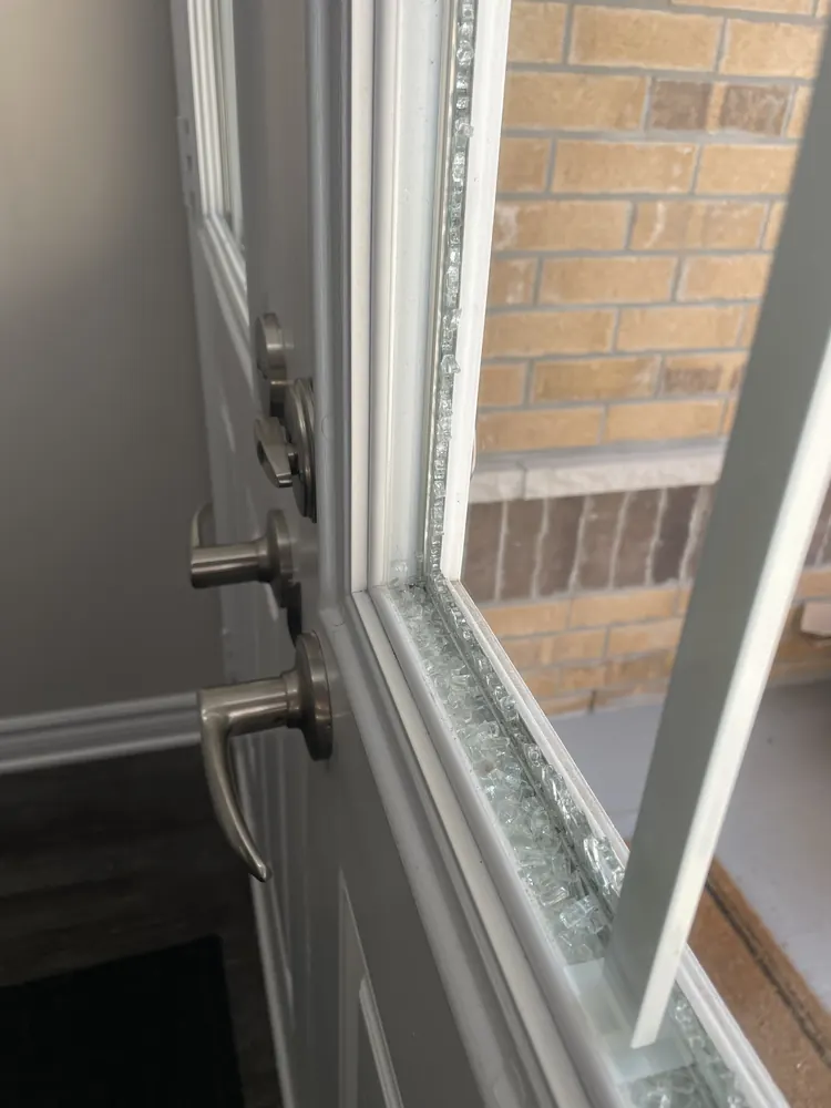 Broken tempered glass in a front door, Ottawa