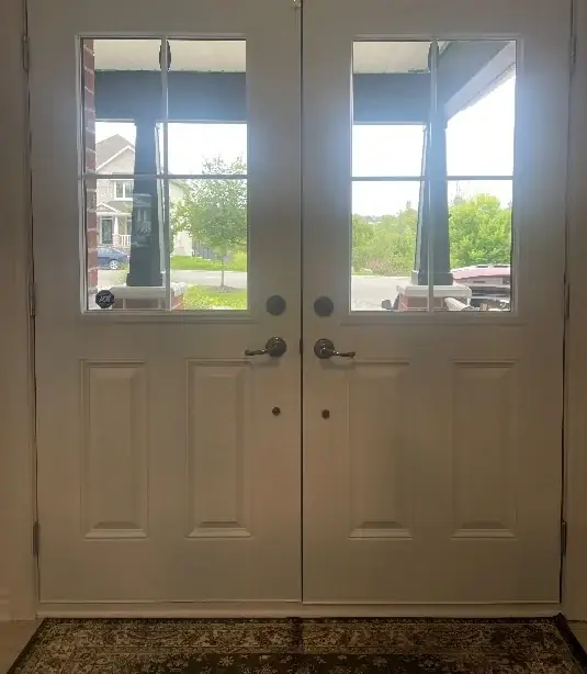 Front door before, with plain glass, Ottawa