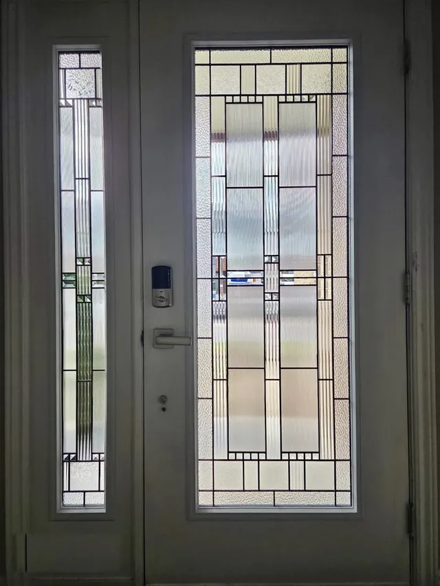 Front door in Ottawa with a new glass door insert after a glass replacement