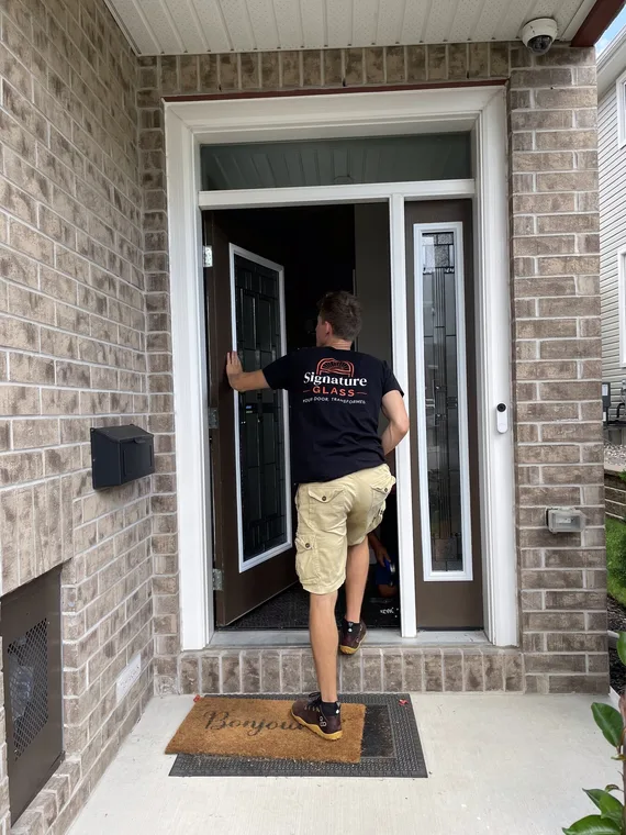 Installing wrought iron glass in an Orléans front door