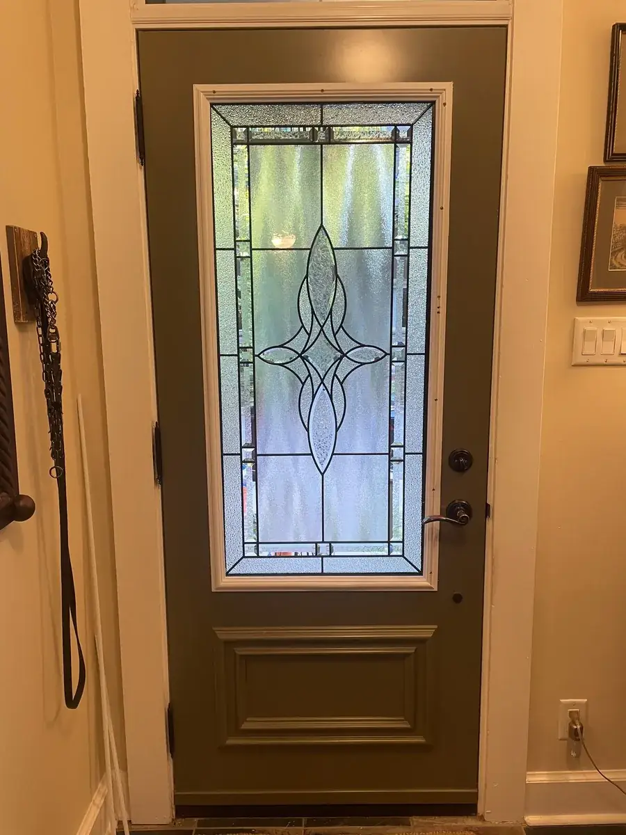 After: solid front door cut for a new stained glass insert, Rockland