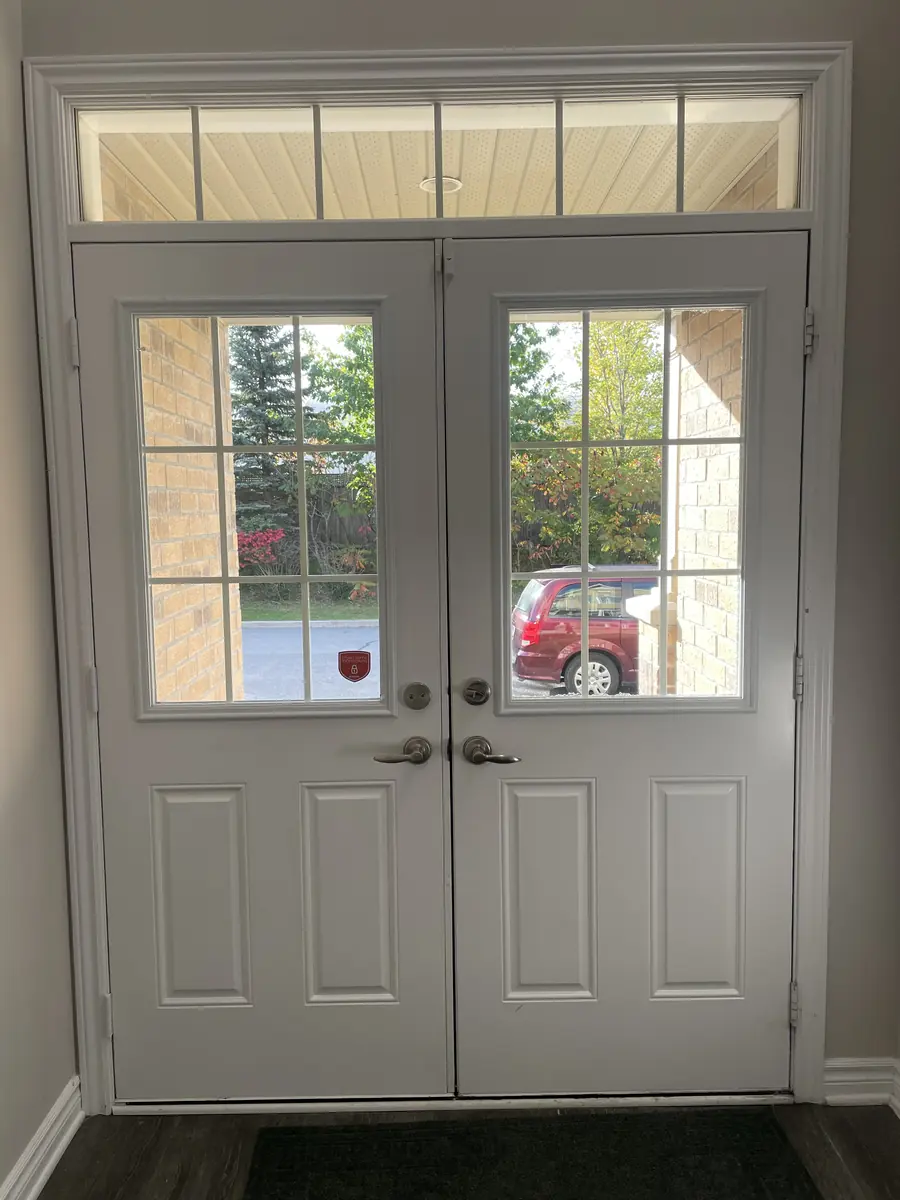 Before: plain grid glass double doors, Stittsville