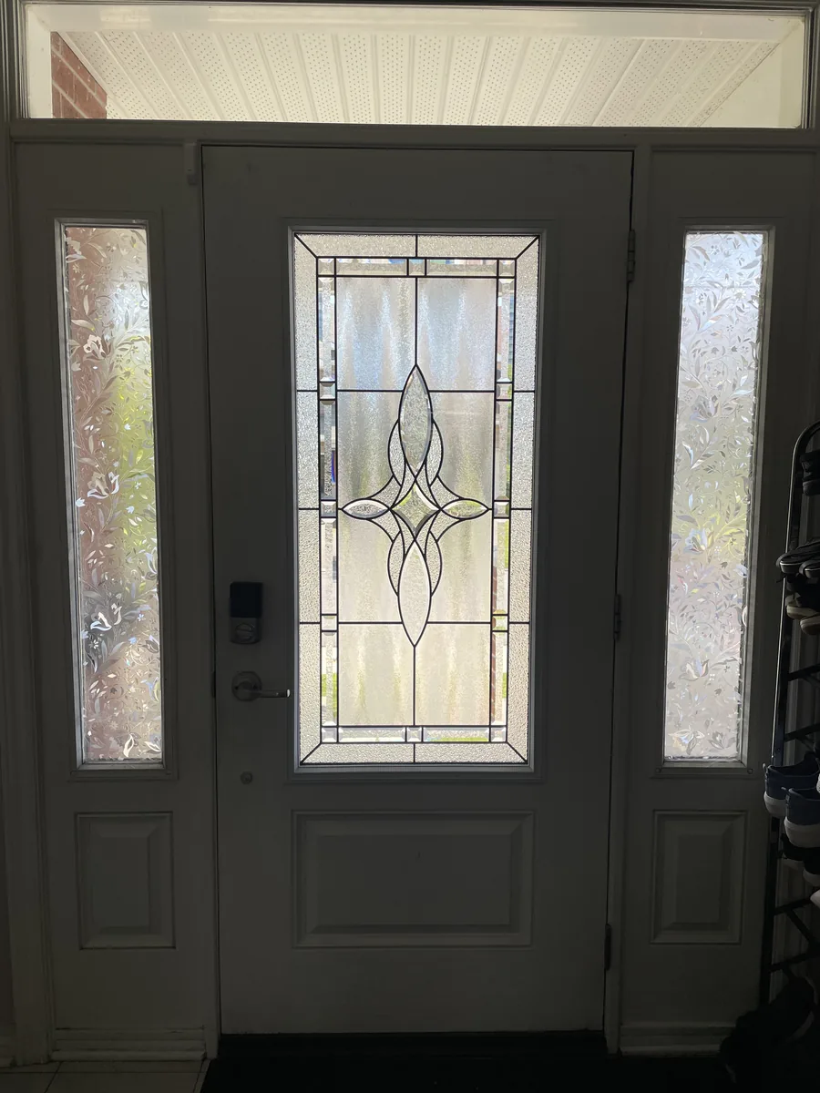 Front door after its new glass insert, Ottawa