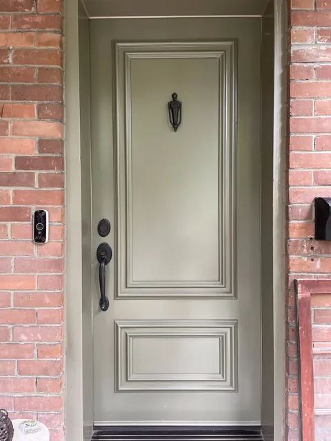 Before: Mark&rsquo;s solid green front door with no glass, Ottawa