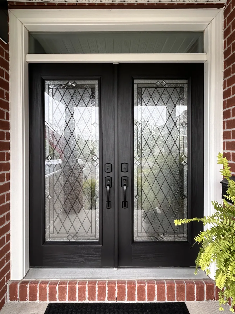 Same double doors with full Huron stained glass, from the street