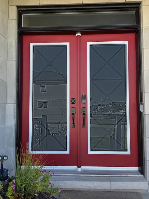 Red double doors with wrought iron glass, Ottawa